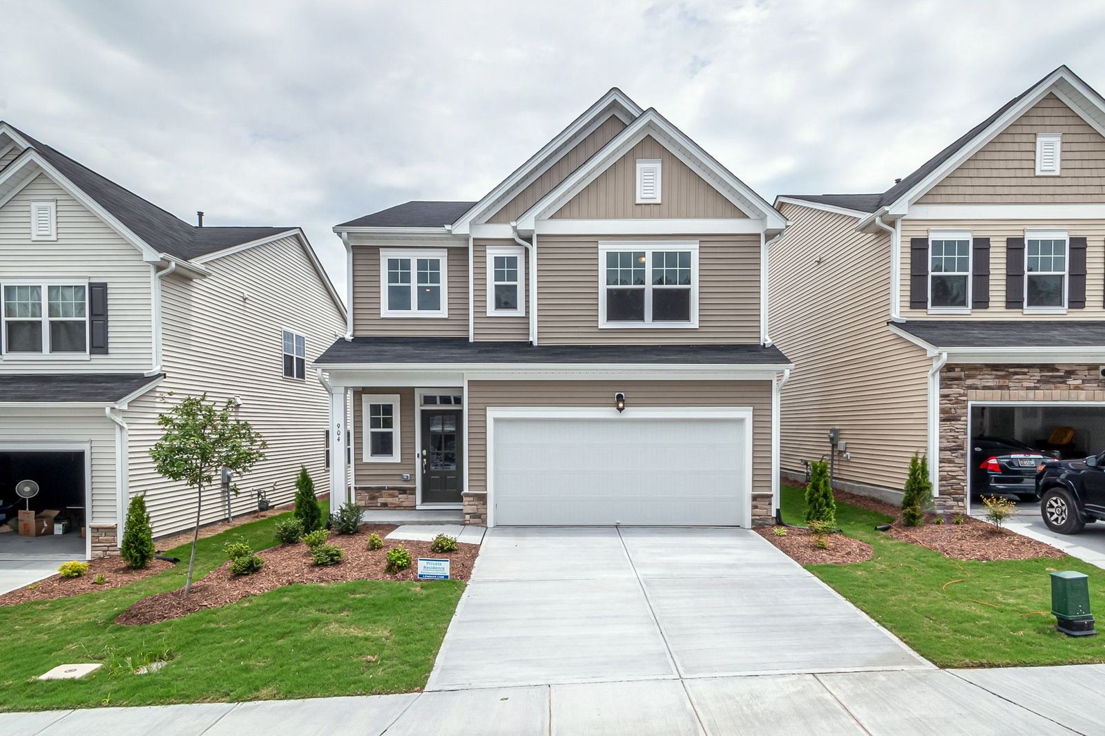 Two-story suburban home with a front lawn