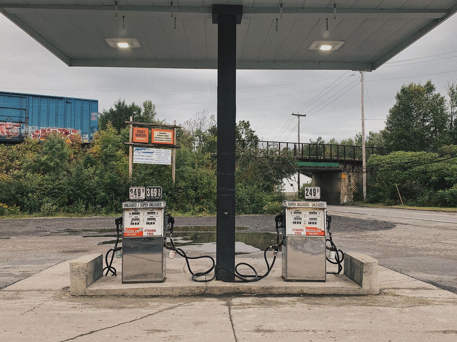 Gas station pumps under a canopy