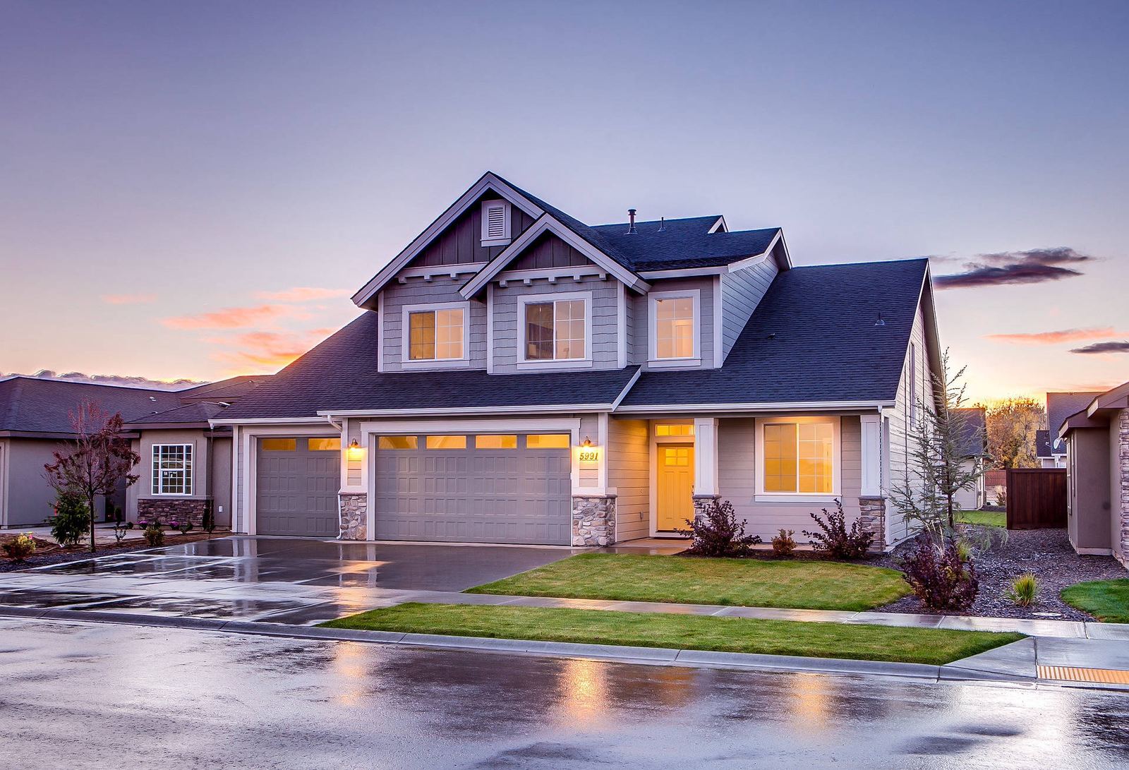 Two-story family home at dusk